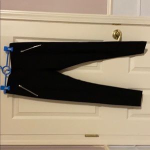 Black pants with zipper pockets